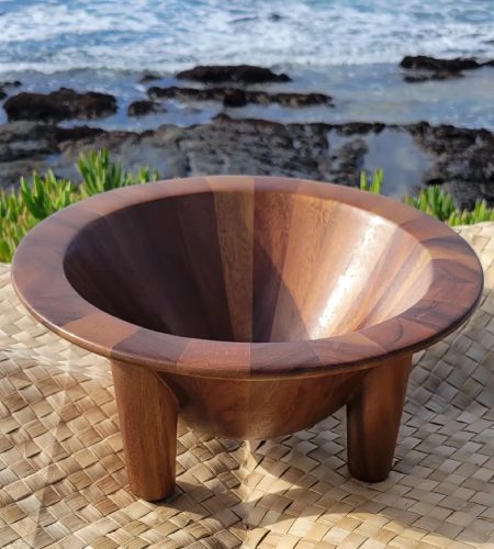 A bowl sitting on top of a wooden floor.